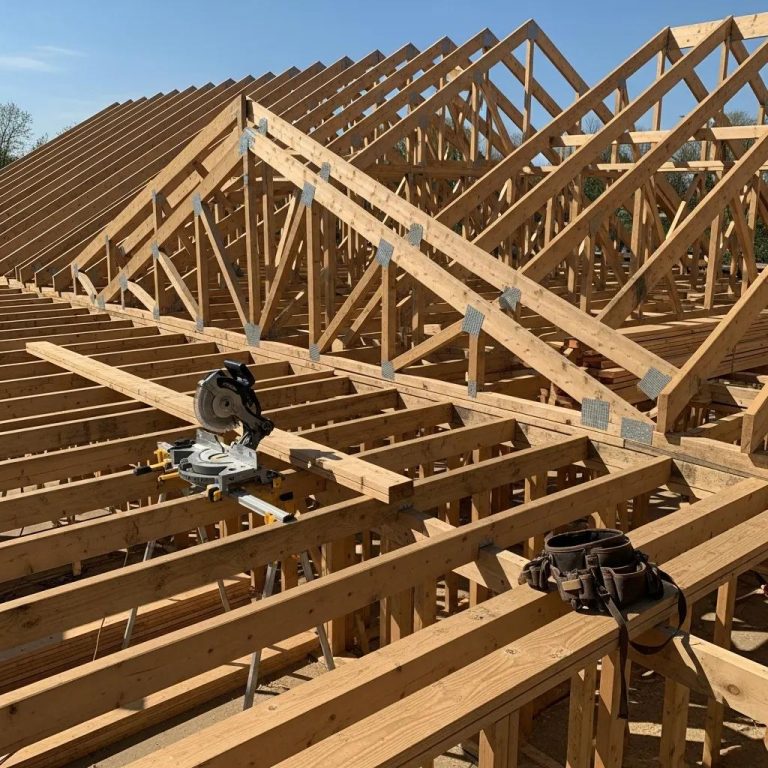 Roof framing process showcasing rafters and trusses in a construction environment