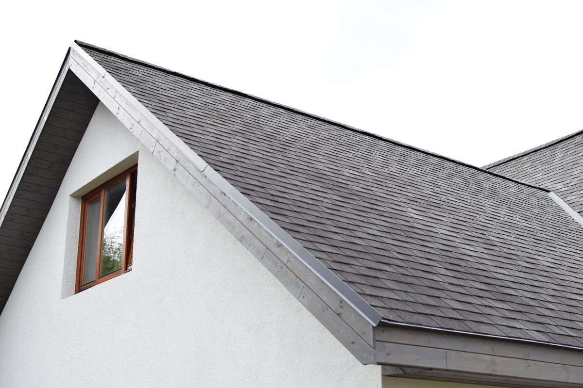 grey asphalt shingles roof with just installed wooden eaves, North Oaks, MN